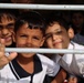 Iraqi Children Wave Iraqi Flags