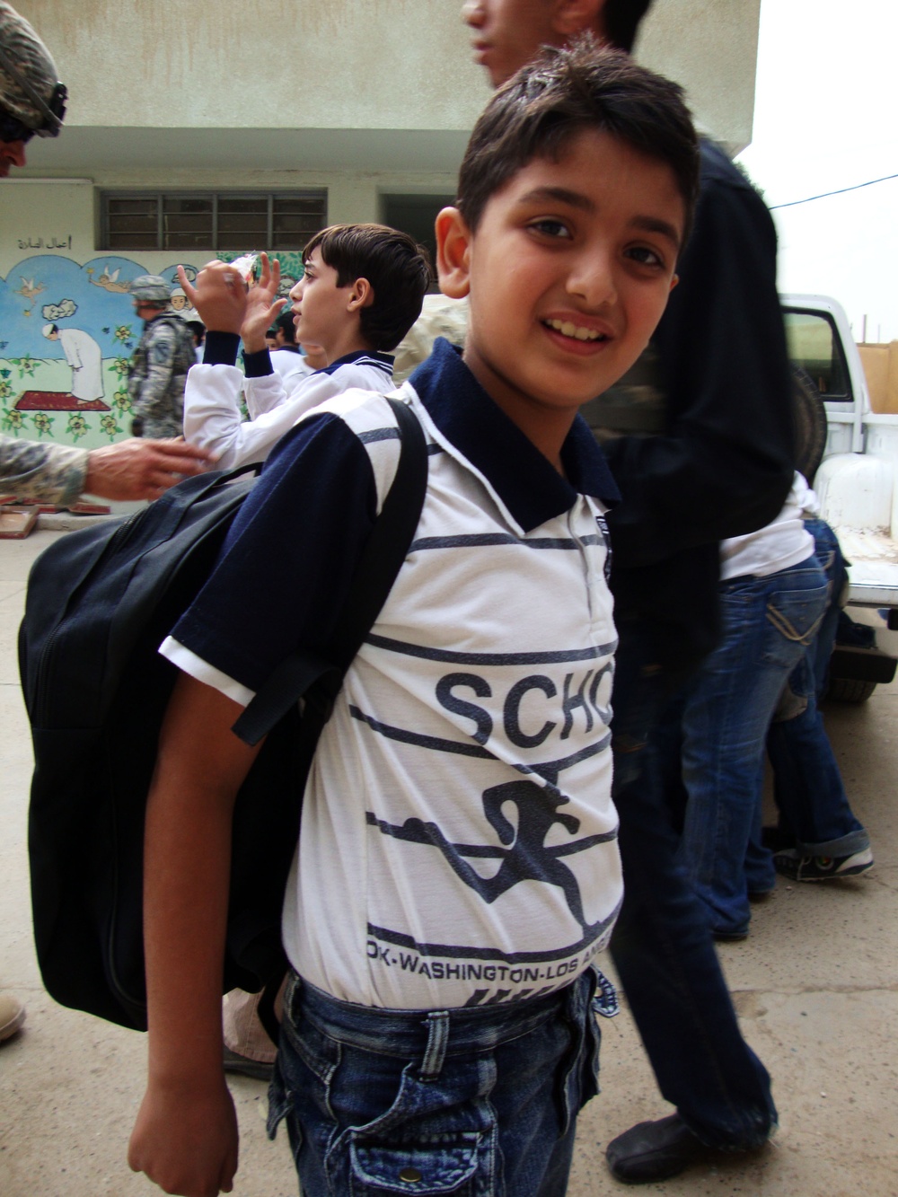 Iraqi Children Wave Iraqi Flags