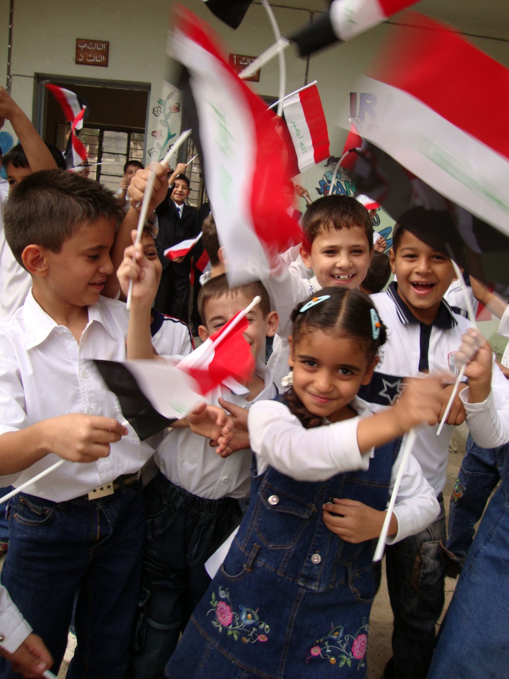 Iraqi Children Wave Iraqi Flags