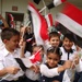 Iraqi Children Wave Iraqi Flags