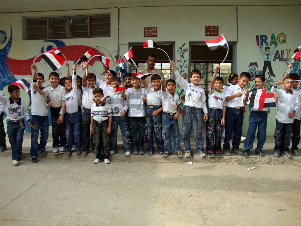 Iraqi Children Wave Iraqi Flags