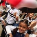 Iraqi Children Wave Iraqi Flags