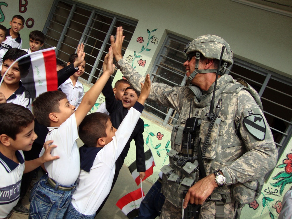 Iraqi Children Wave Iraqi Flags