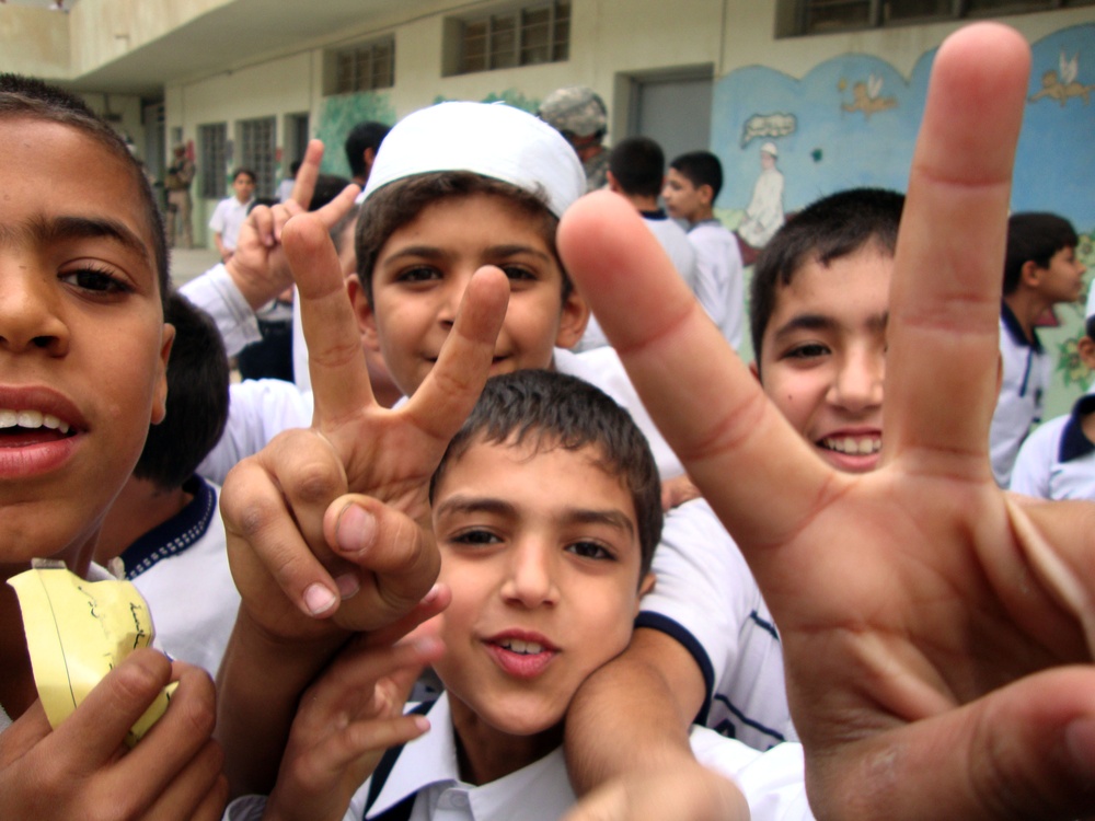 Iraqi Children Wave Iraqi Flags