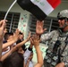 Iraqi Children Wave Iraqi Flags