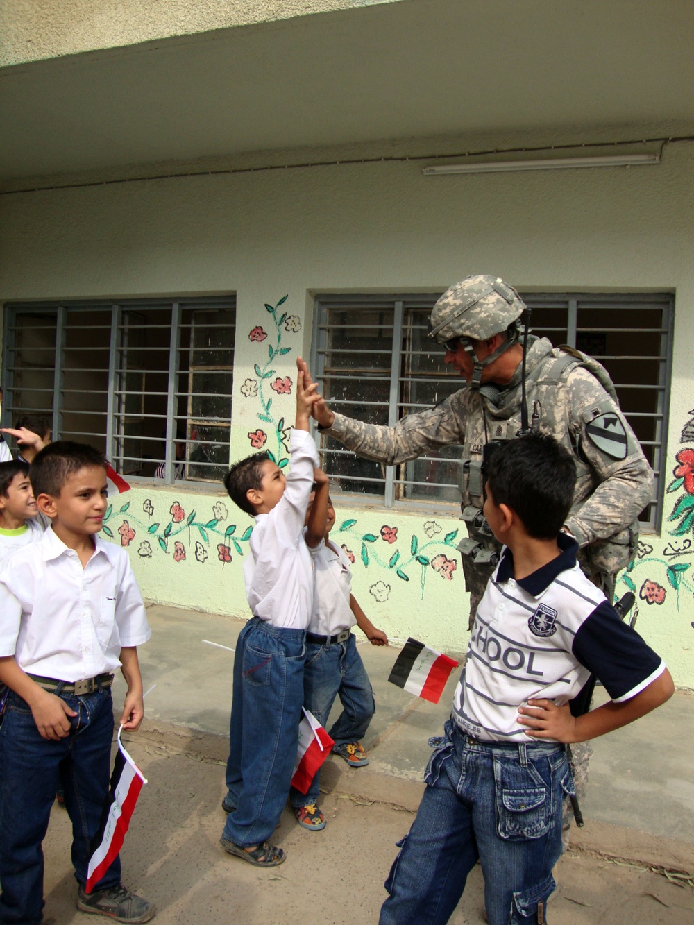 Iraqi Children Wave Iraqi Flags