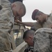 Iraqi soldiers give class on vehicle maintenance