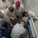 Iraqi soldiers give class on vehicle maintenance