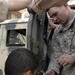 Iraqi soldiers give class on vehicle maintenance