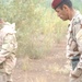 Iraqi soldiers search for weapons