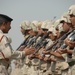Iraqi soldiers rehearse for graduation