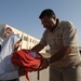 Children receive backpacks, other supplies