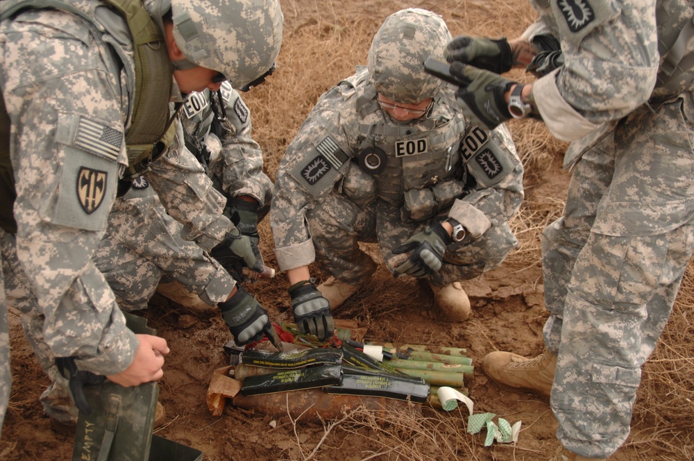EOD soldiers prepare to blow weapons cache