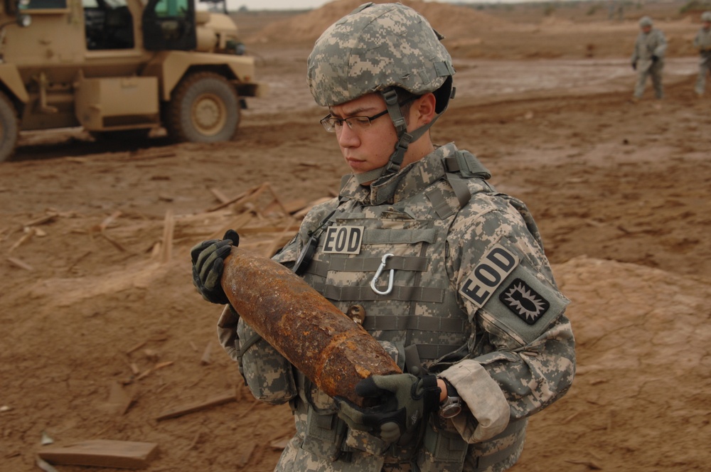 EOD soldiers prepare to blow weapons cache