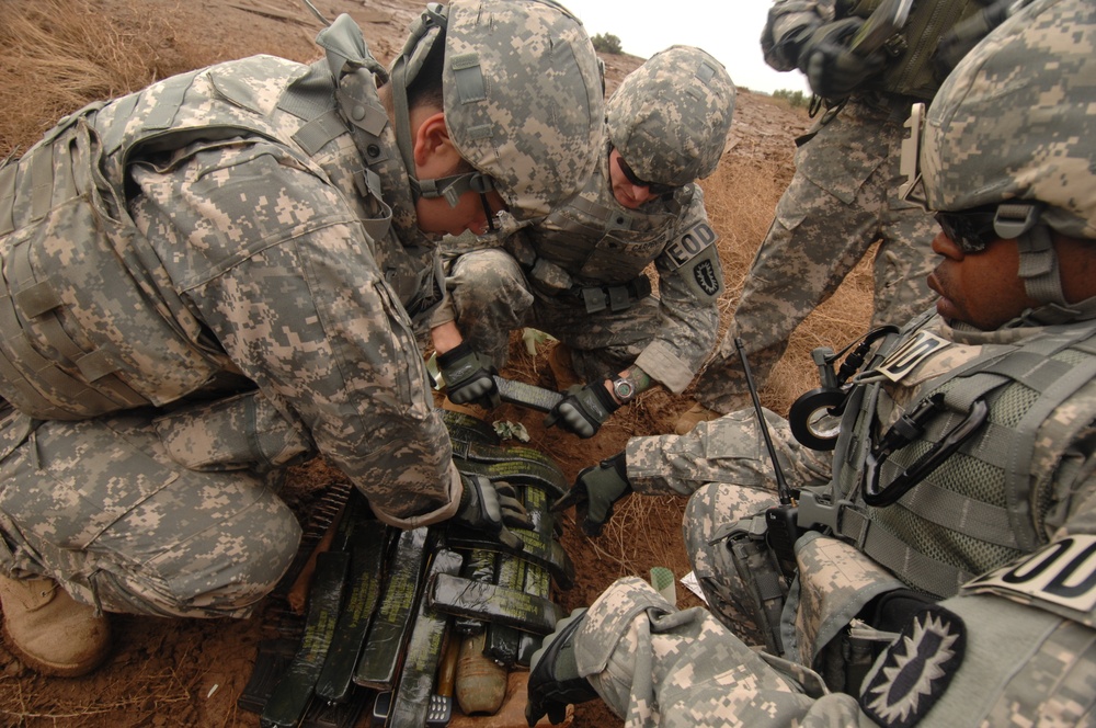EOD soldiers prepare to blow weapons cache
