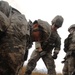 EOD soldiers prepare to blow weapons cache