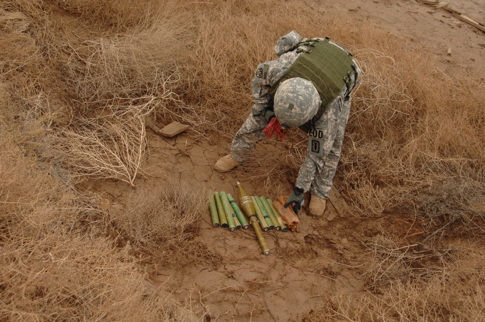 EOD soldiers prepare to blow weapons cache