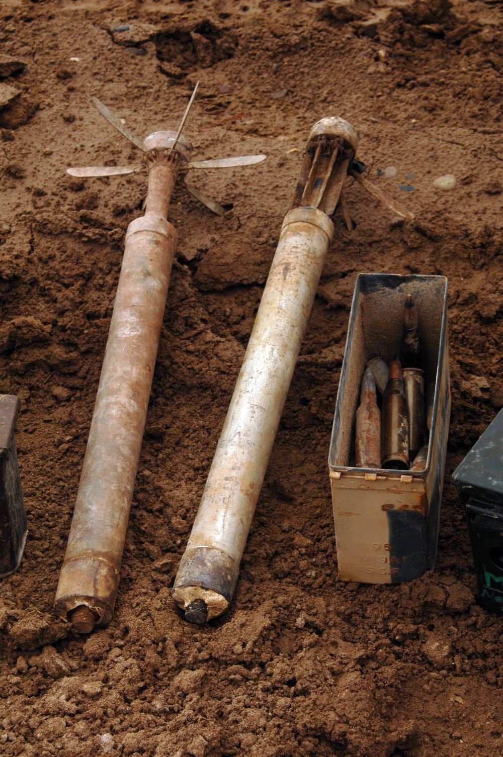 EOD soldiers prepare to blow weapons cache