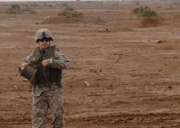 EOD soldiers prepare to blow weapons cache