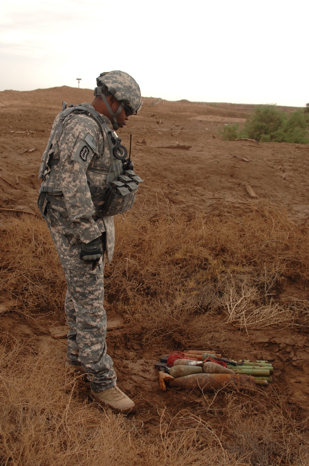EOD soldiers prepare to blow weapons cache