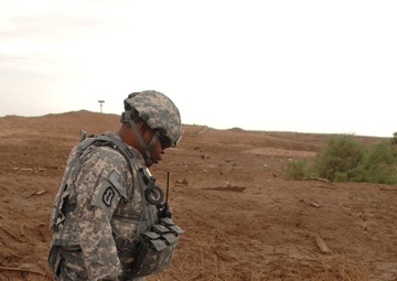 EOD soldiers prepare to blow weapons cache