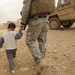 Soldiers inspect wells, visit children