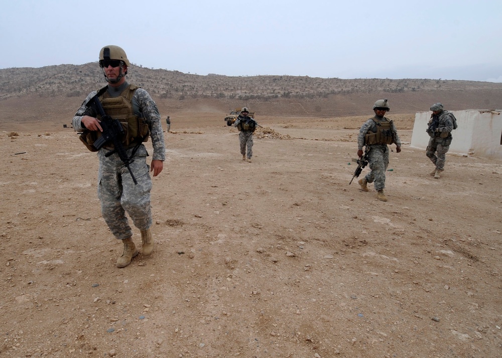 Soldiers inspect wells, visit children