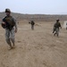 Soldiers inspect wells, visit children