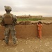 Soldiers Inspect Wells, Visit Children