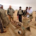 Soldiers inspect wells, visit children