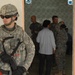 U.S. troops work with Iraqi police