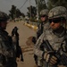 U.S. troops work with Iraqi police