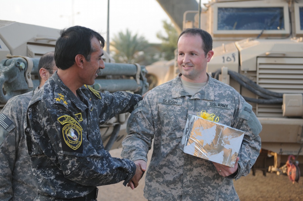 Iraqi Soldiers Attend Soldiers Promotion