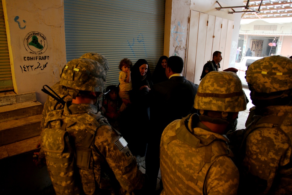 U.S. Soldiers Inspect New Marketplace
