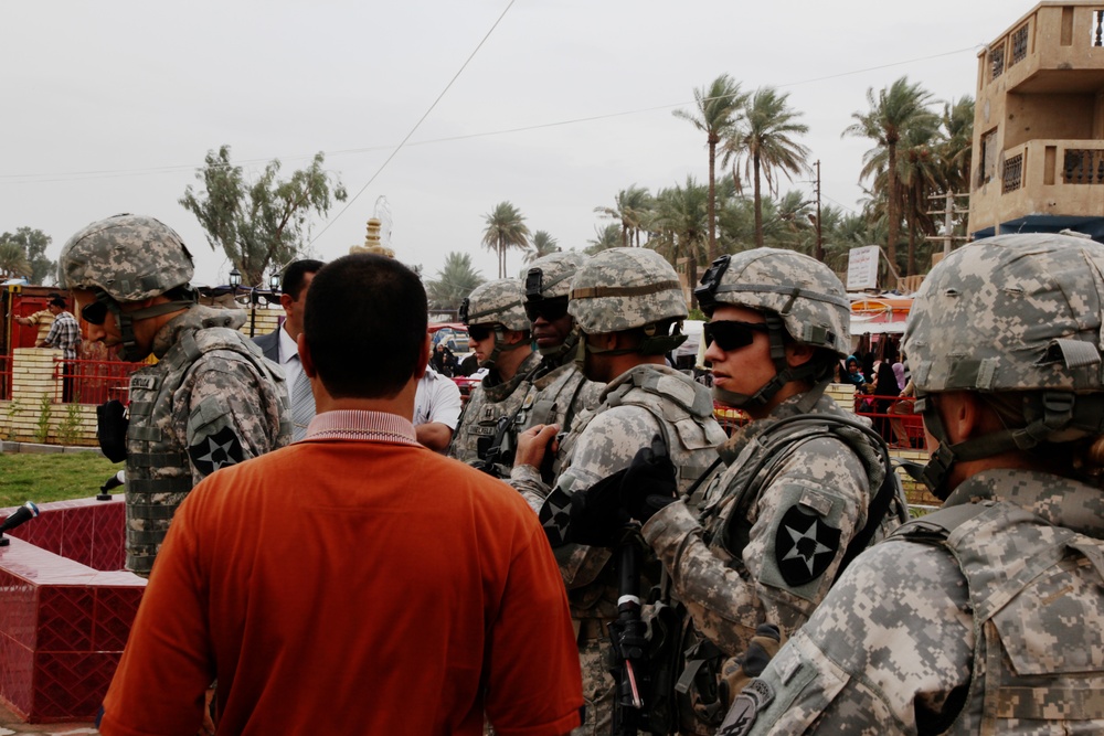 U.S. Soldiers Inspect New Marketplace