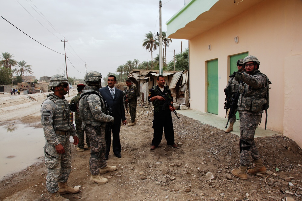 U.S. Soldiers Inspect New Marketplace