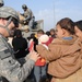 Soldiers give clothes, toys to local Iraqis