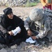 Soldiers give clothes, toys to local Iraqis