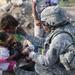 Soldiers give clothes, toys to local Iraqis