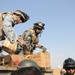Soldiers give clothes, toys to local Iraqis