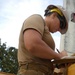 U.S. Navy Seabees, Local Residents Build School Together