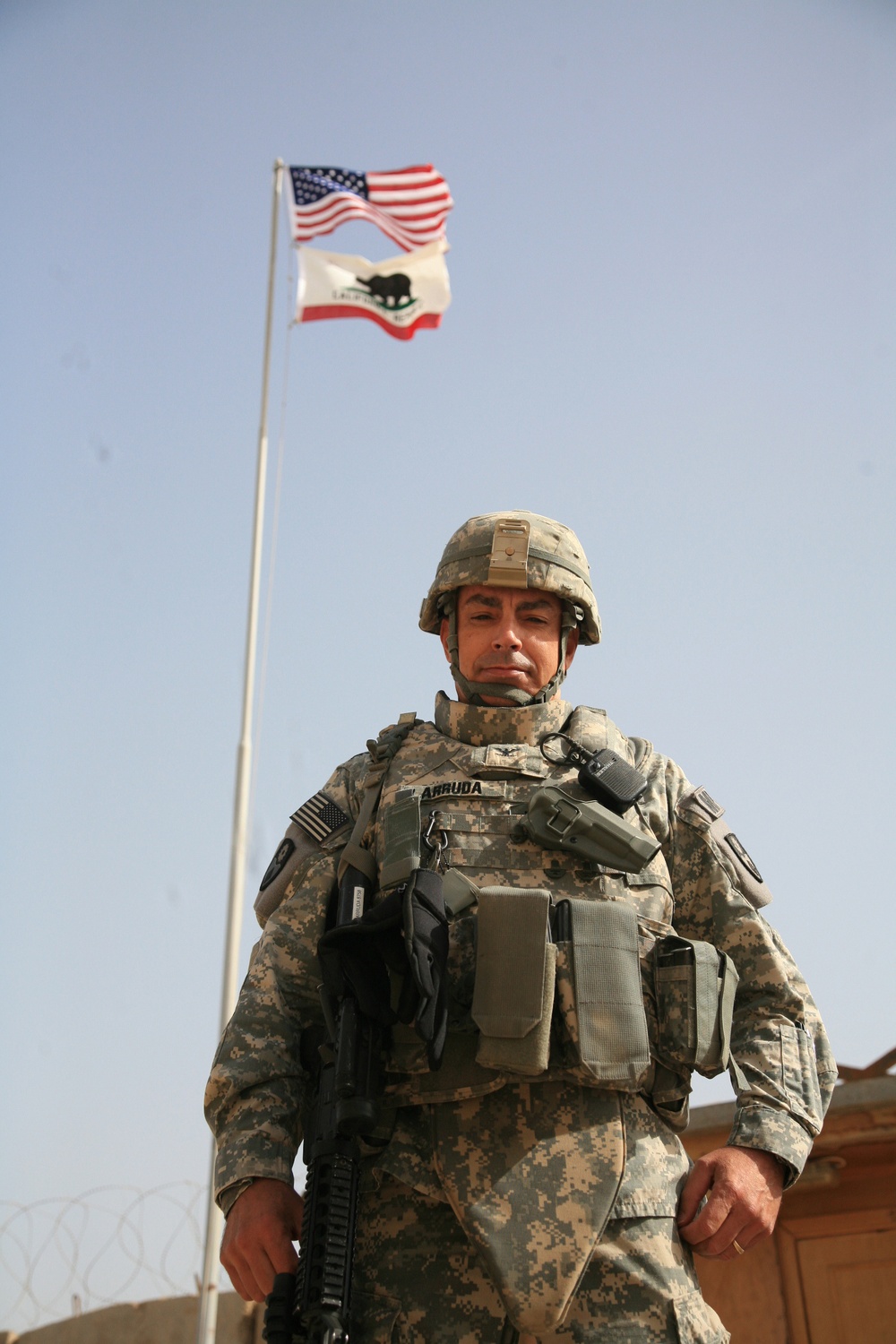 49th MP Brigade raises Golden State flag over Iraq