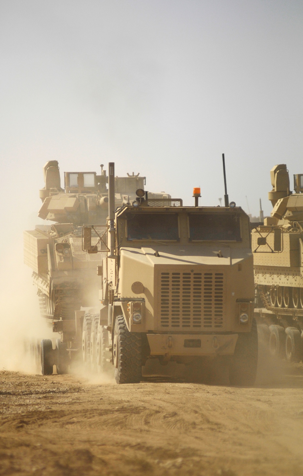 Soldiers load convoy