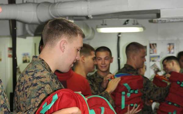 Shipmates stuff backpacks for Project Handclasp