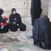 U.S., Iraqi troops deliver supplies to locals