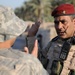 U.S., Iraqi troops deliver supplies to locals