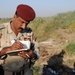 U.S., Iraqi troops deliver supplies to locals