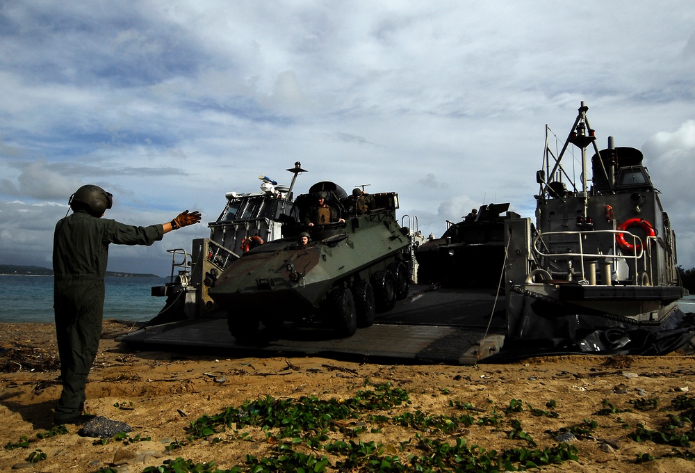 USS Harpers Ferry offloads Marines, takes on supplies