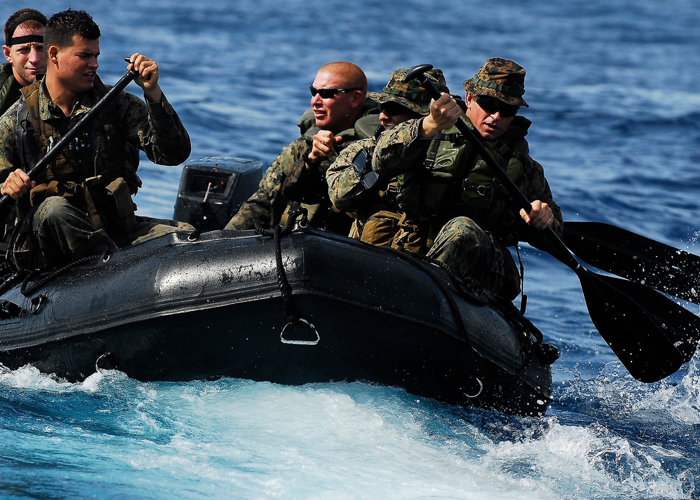 USS Harpers Ferry offloads Marines, takes on supplies