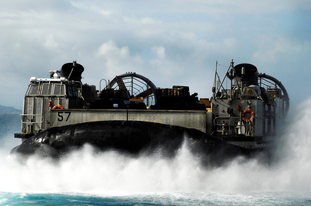 USS Harpers Ferry offloads Marines, takes on supplies